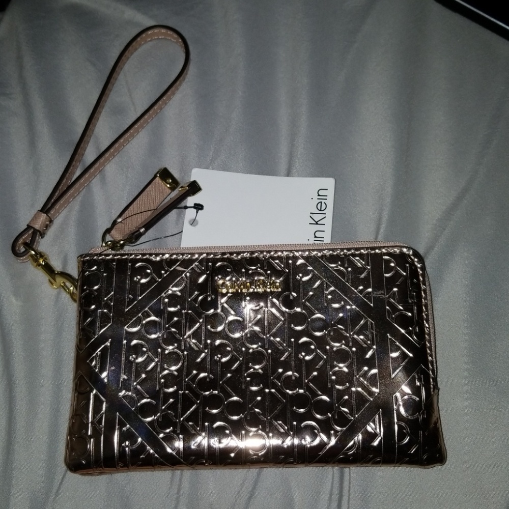 ❌ SOLD Calvin Klein rose gold wristlet NWT